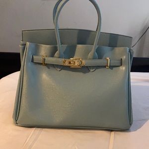 Luxury teal/Tiffany blue handbag w/ gold details